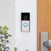 Battery Video Doorbell Plus installed beside a front door, providing enhanced security.