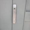 Philips smart door lock installed on a wooden villa door in Dubai