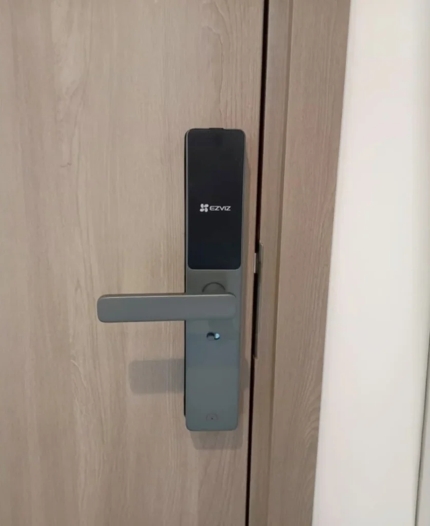EZVIZ smart lock installation on interior wooden door side in Dubai