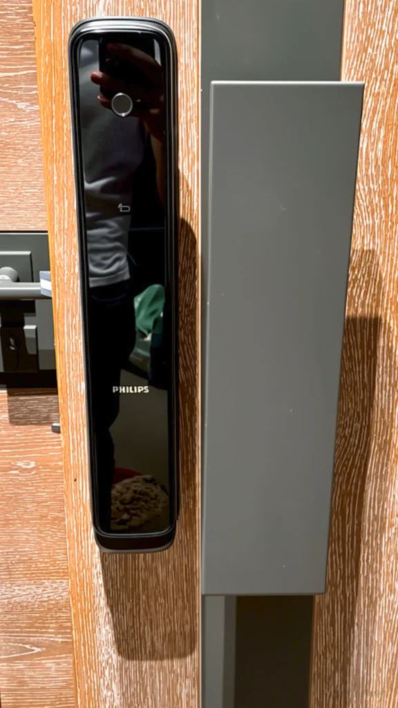 Philips fingerprint lock installation on wooden door in Dubai