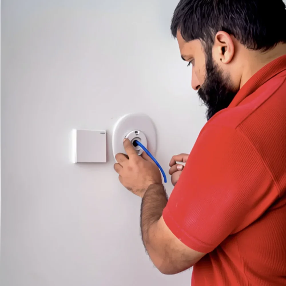 Ecobee thermostat installation by technician in Dubai